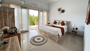 A spacious bedroom with a large bed, a wooden desk, a coffee maker, and a view of the outdoors. - Kaylas Hill Resort (Penida Island)