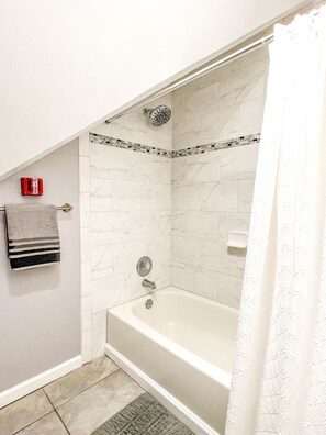 Hair dryer, towels, soap, shampoo