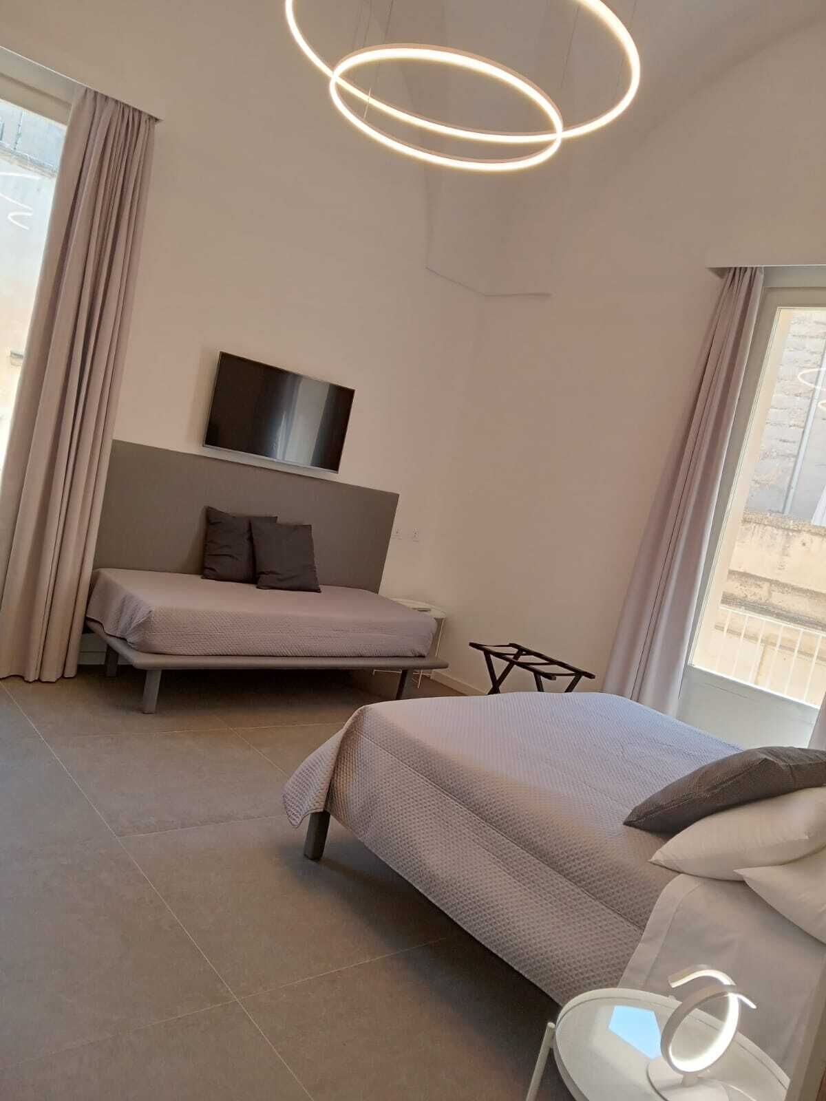 Deluxe Triple Room, Multiple Beds, Accessible, Ensuite | Premium bedding, down comforters, memory foam beds, minibar