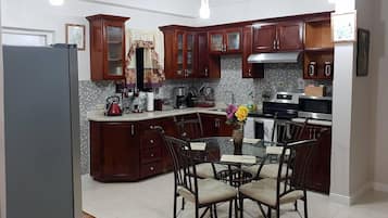 Apartment | Private kitchen | Fridge, microwave, oven, stovetop