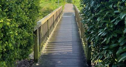 Deichbrise Vacation Home: A Relaxing Family Vacation in Greetsiel with a Fireplace and Garden
