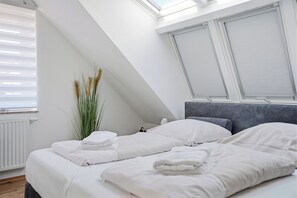 3 bedrooms, desk, iron/ironing board, travel cot