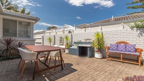 Outdoor dining - The Reef is a little piece of heaven and the perfect place to enjoy your next beach getaway. (Boomerang Beach)