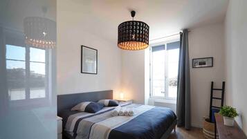 2 bedrooms, soundproofing, iron/ironing board, travel cot