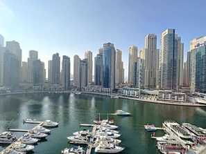 Stunning marina views surround this waterfront property, offering a glimpse into the bustling harbor.