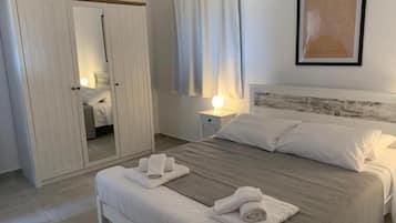 2 habitaciones, tabla de planchar con plancha, wifi y ropa de cama