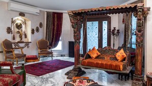 A traditional room with a four-poster bed, ornate furniture, and a red carpet. - Vesta - Mokattam Residence (Cairo)