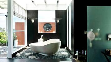 Luxury Villa | Bathroom | Deep soaking tub, rainfall showerhead, free toiletries, hair dryer