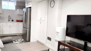 Comfort Apartment | Living area | 60-inch flat-screen TV with digital channels, TV, heated floors