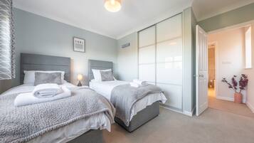 3 bedrooms, iron/ironing board, travel crib, internet