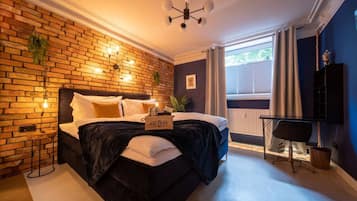 2 slaapkamers, een bureau, een strijkplank/strijkijzer, gratis wifi