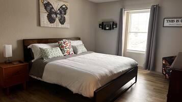 1 bedroom, desk, iron/ironing board, travel crib