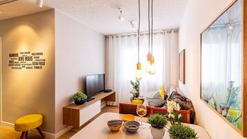 Apartment | Living area | 40-inch TV with satellite channels