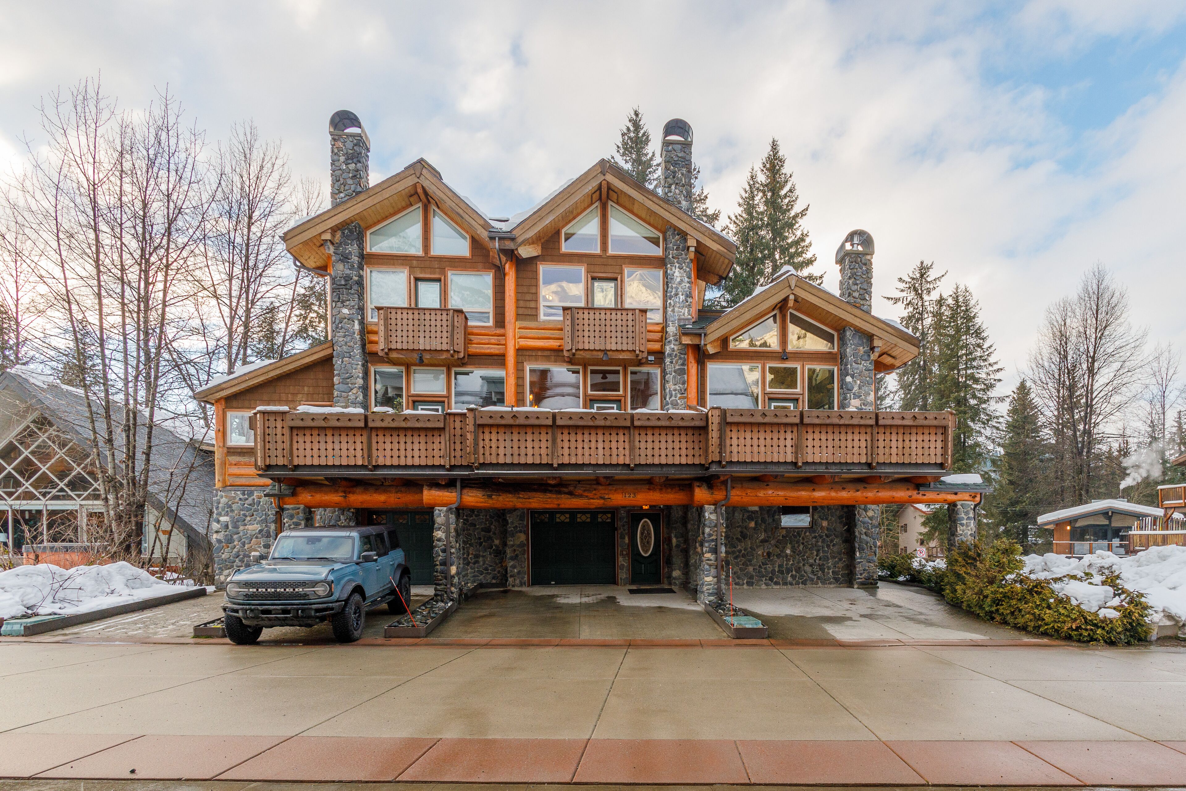 Mountain-view townhome with hot tub, fireplace, & gear storage - walk to lifts