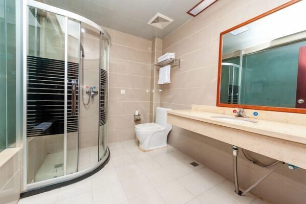 A modern bathroom with a glass shower enclosure, a toilet, and a vanity with a mirror. - Yaoli Holiday Hotel (Fuliang)