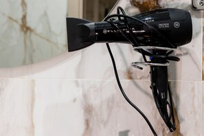 Junior Quadruple Room | Bathroom | Shower, rainfall showerhead, designer toiletries, hair dryer