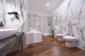 Suite | Bathroom | Shower, rainfall showerhead, designer toiletries, hair dryer