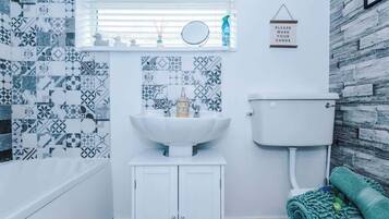 Shower, hair dryer, shampoo