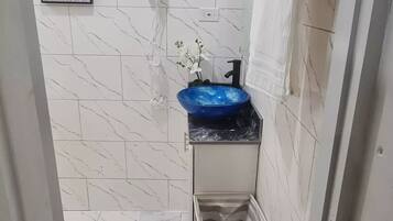 Hair dryer, towels, soap, toilet paper