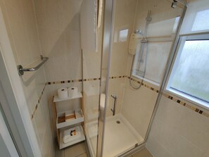 Shower, hair dryer, towels, soap