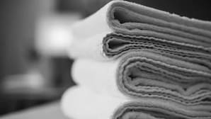 A stack of folded towels with a textured surface, likely made of cotton or a similar material. - Deluxe room with panoramic view (Toscana)