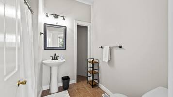 Hair dryer, towels, soap, shampoo