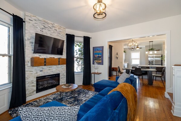 Smart TV, fireplace, books