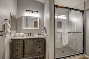 Shower, hair dryer, towels, soap