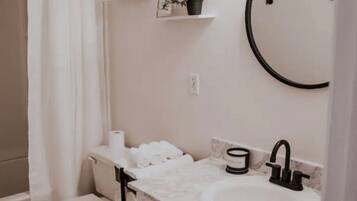Hair dryer, towels, soap, shampoo