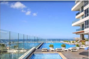 Outdoor pool - Ocean view apartment with Marriot hotel services (santa martha)