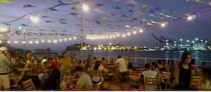 Outdoor dining - Ocean view apartment with Marriot hotel services (santa martha)