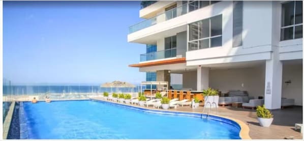 Outdoor pool - Ocean view apartment with Marriot hotel services (santa martha)