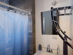 Hair dryer, towels, soap, shampoo