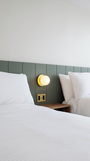 Deluxe Double Queen Room | 1 bedroom, premium bedding, pillowtop beds, desk