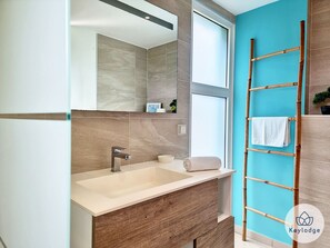 Shower, hair dryer, towels, soap