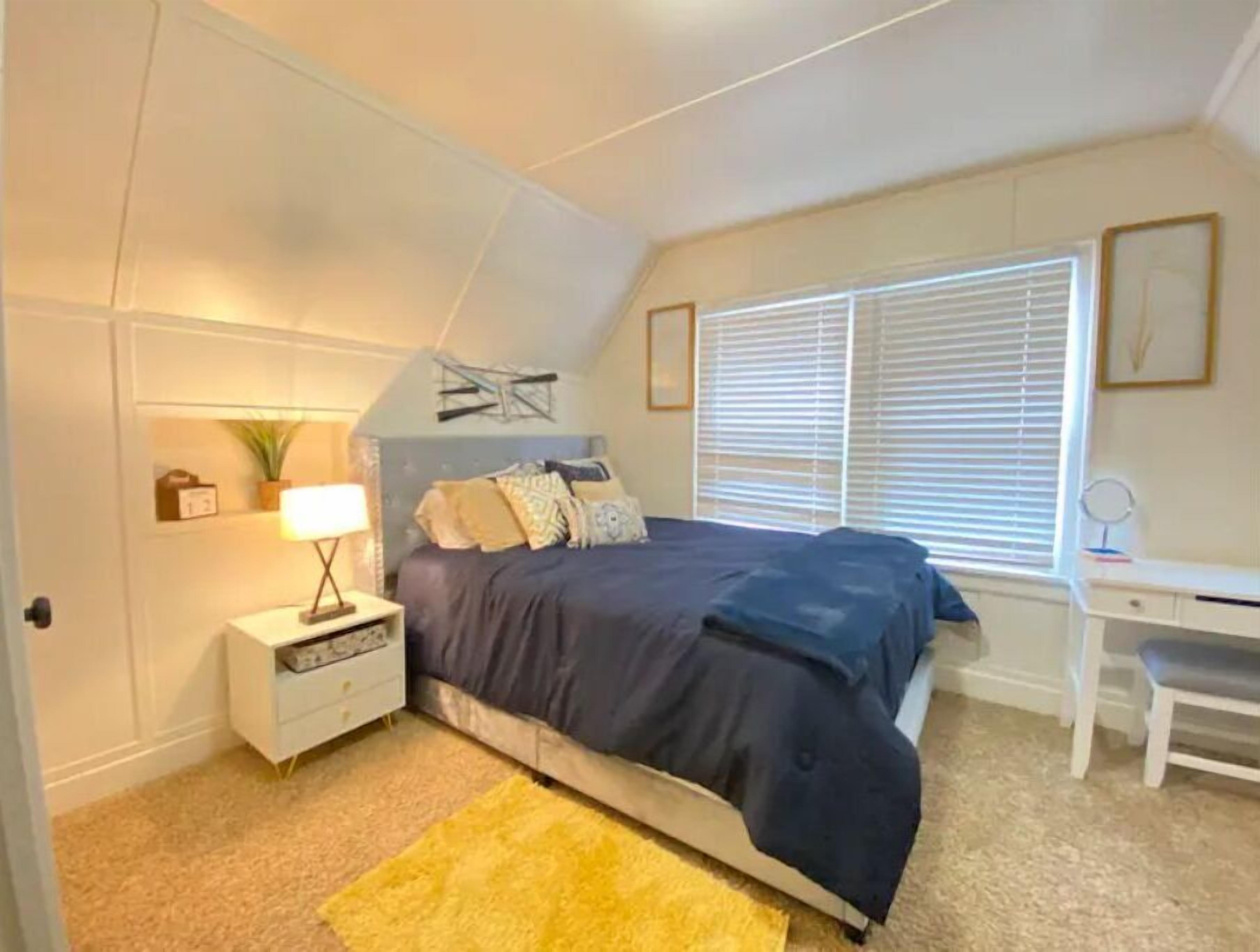 1 bedroom, desk, iron/ironing board, travel crib