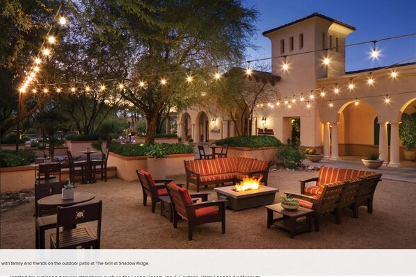 An outdoor patio with seating and a fire pit at The Grill at Shadow Ridge. - 1BD/1BA Villa @ Marriot's Shadow Ridge I - The Villages - BNP Tennis Week! (Palm Desert)