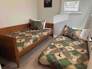 2 bedrooms, desk, blackout curtains, iron/ironing board