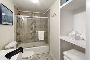 Hair dryer, towels, soap, toilet paper