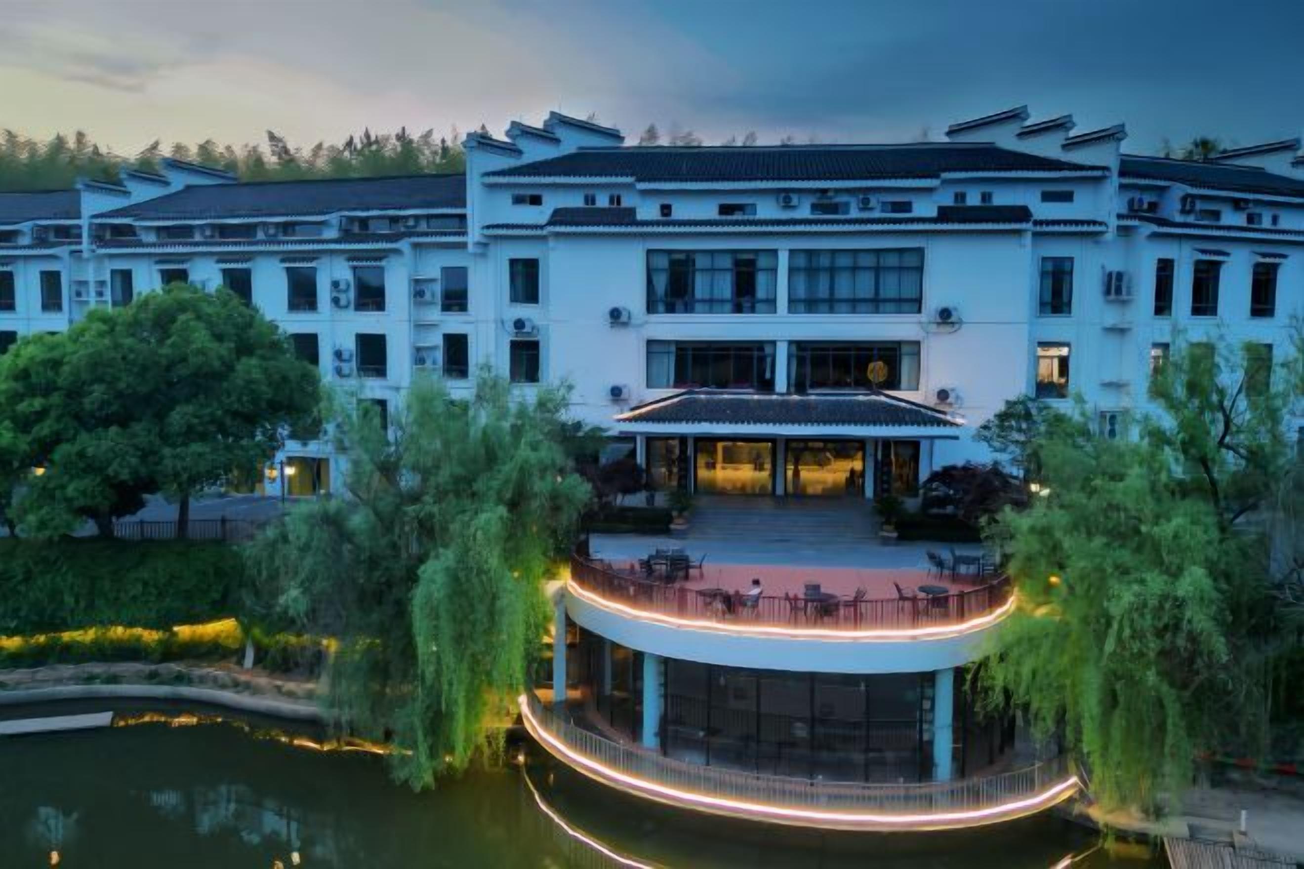 A traditional building with a courtyard and a circular viewing platform.
