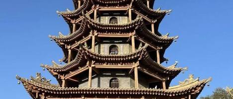 A multi-tiered pagoda-style structure with traditional architectural elements.