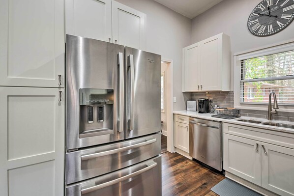 Microwave, stovetop, dishwasher, dining tables