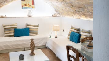 Junior suite, uitzicht op binnenplaats | Woonruimte