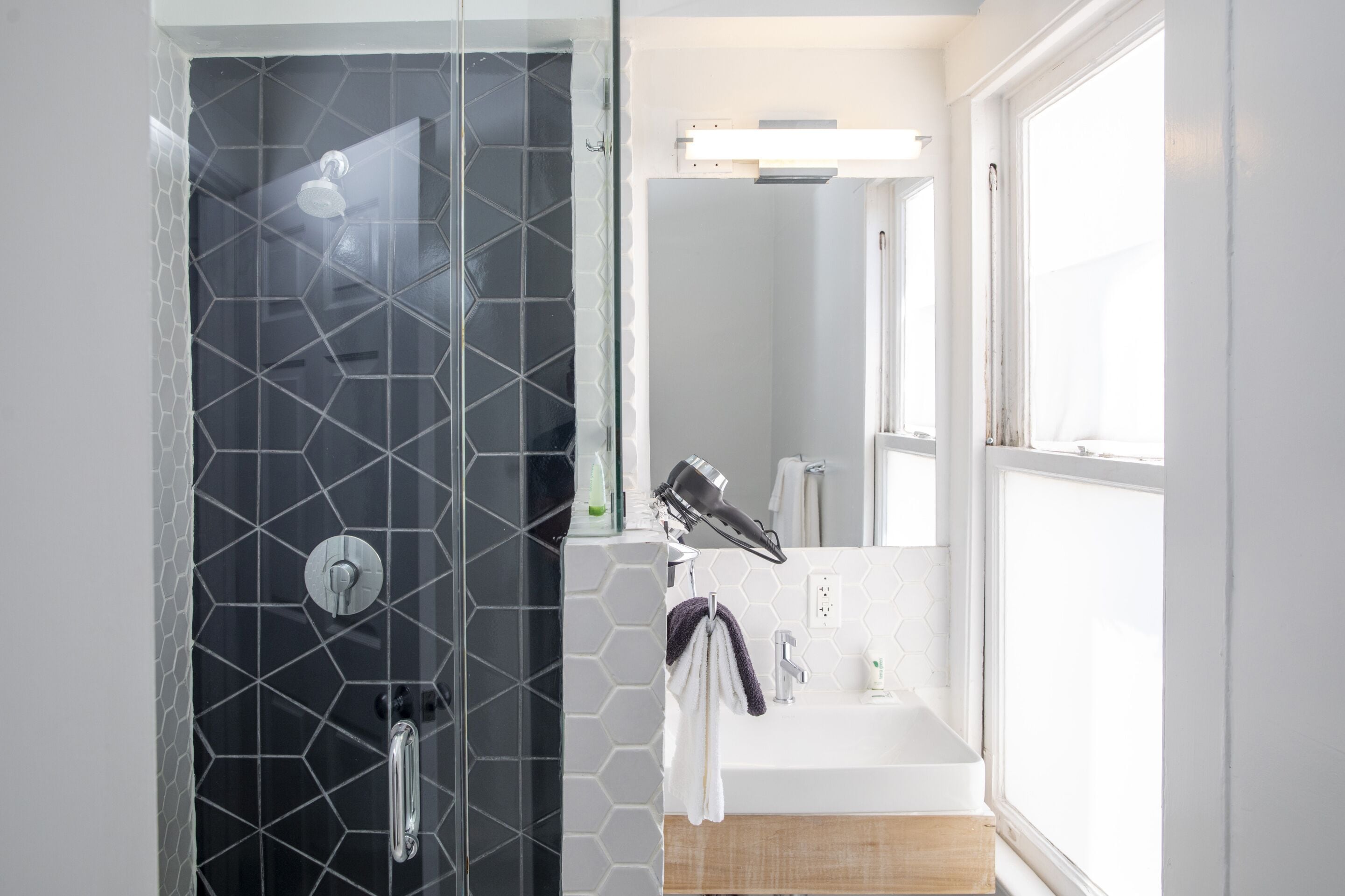Shower, hair dryer, towels