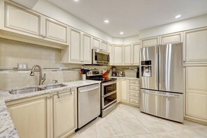 Fridge, microwave, oven, stovetop - CP 223 Ocean View Condo - Vacation Rental in Ocean Village (Fort Pierce)