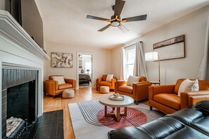 Smart TV, fireplace, books