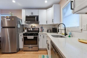 Fridge, oven, dishwasher, coffee/tea maker