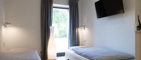 2 chambres, fer et planche à repasser, Wi-Fi, draps fournis
