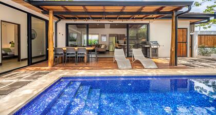 Modern home near the beach & stores with private pool, grill, patio, W/D, & AC