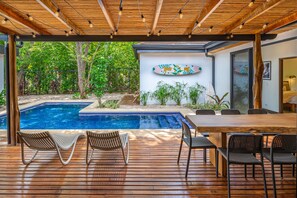 Outdoor dining - Modern home near the beach & stores with private pool, grill, patio, W/D, & AC (Tamarindo)
